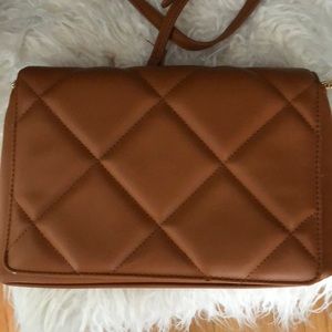Tan quilted target purse never used